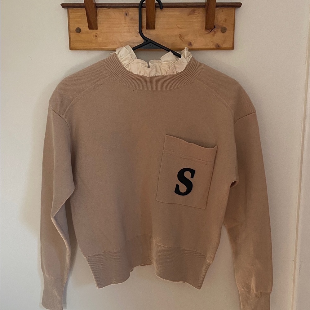 Sandro Cream Sweater with Ruffle Neck and Pocket